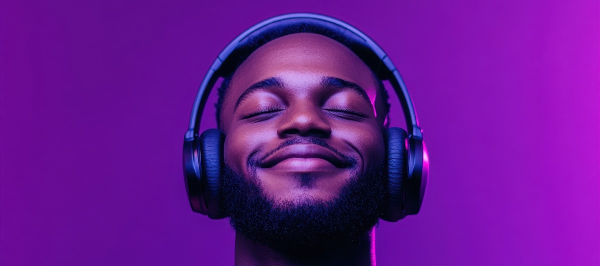 5 Reasons to Try Amino Acid Treatment-4-Happy 2 A man wearing headphones smiles due to mental clarity after amino acid treatment