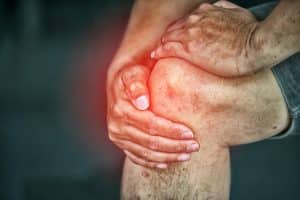 Man Suffering from knee pain, leg pain