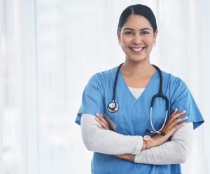 Shot of a medical practitioner standing with her arms crossed.