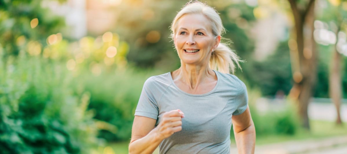 Are Facet Joint Injections Right for Your Back Pain-5 A woman smiles as she jogs pain-free after facet joint injections