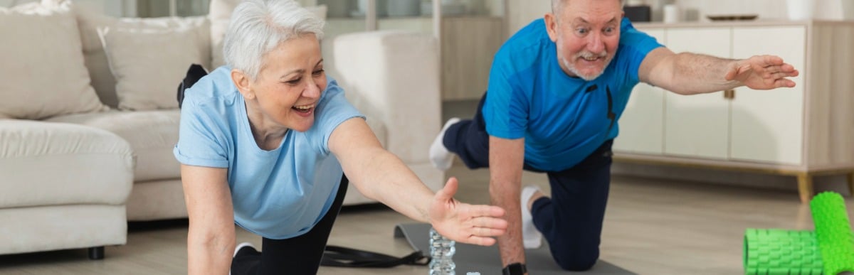 Heart Disease Symptoms You Need to Know - 2026-05-28T095953.702 An older couple smiles as they hold a yoga pose after platelet rich plasma therapy for pain