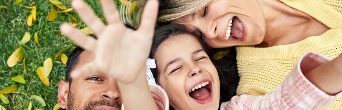 Heart Disease Symptoms You Need to Know - 2026-07-22T103248.201 A woman smiles as she takes a picture with her family after peripheral nerve stimulation