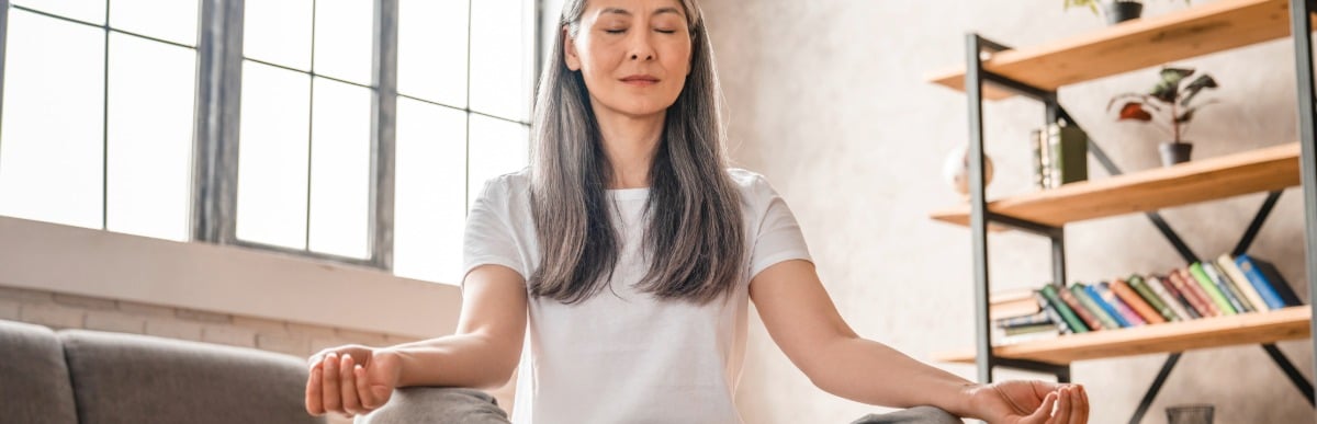 Heart Disease Symptoms You Need to Know - 2026-08-12T131621.071 A woman sits on the floor and meditates after Emsculpt Neo treatments
