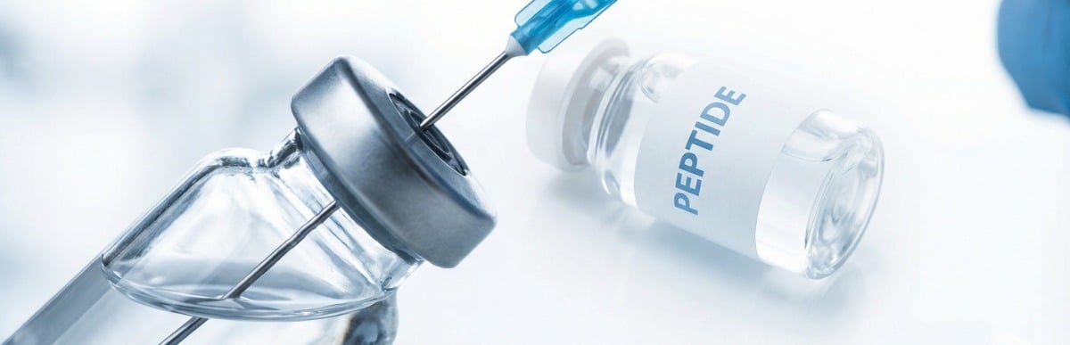 Heart Disease Symptoms You Need to Know (98) An injection needle is being prepared for peptide therapy for muscle recovery