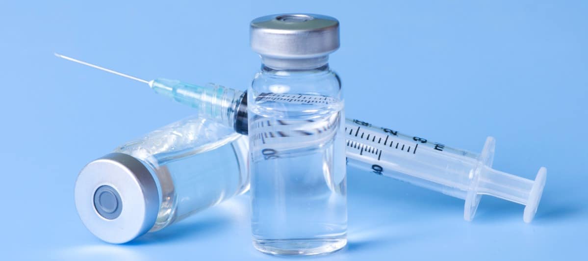 How Do You Treat Spinal Stenosis Without Surgery-5-Needles Two injection needles are next to a vial of medicine used to treat spinal stenosis