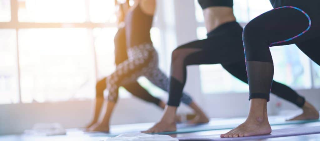 A yoga class stretches
