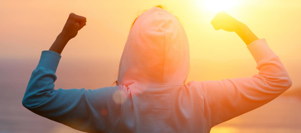 Overcoming Spinal Stenosis Treatment Options and Success Rates-6-Strong back A person flexes their biceps to show a strong back after spinal stenosis treatment options