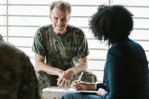 Man with PTSD getting a consulting for Stellate Ganglion block treatment