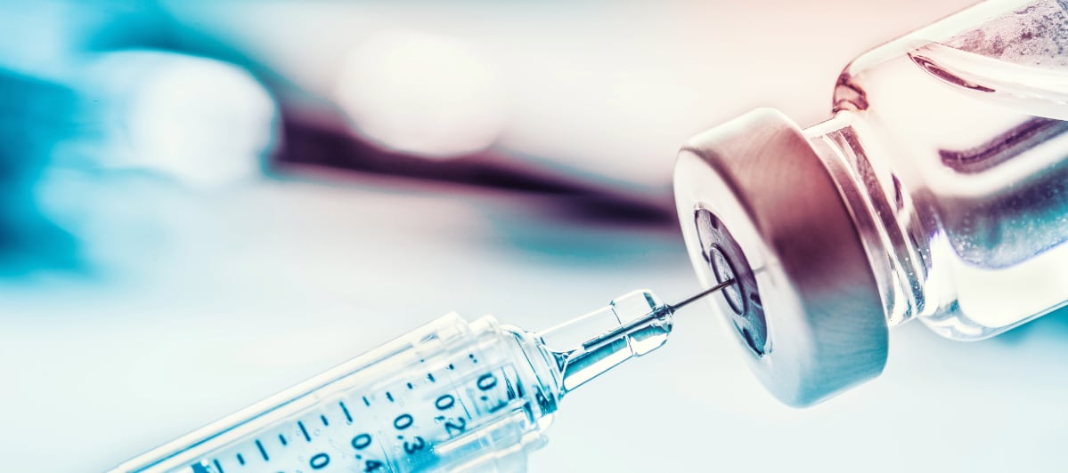 Relieve Your Back Pain with Sacroiliac Joint Injections-3-Injection An image of a syringe withdrawing medicine from a vial