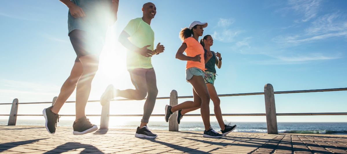 Relieving Spinal Stenosis Pain Non-Surgical Treatment Options-6-Exercise A group of people jog together due to improved health from non-surgical treatment for spinal stenosis