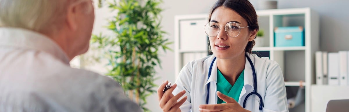 What Is Injection Therapy-6 A doctor in a lab coat discusses injection therapy with her patient