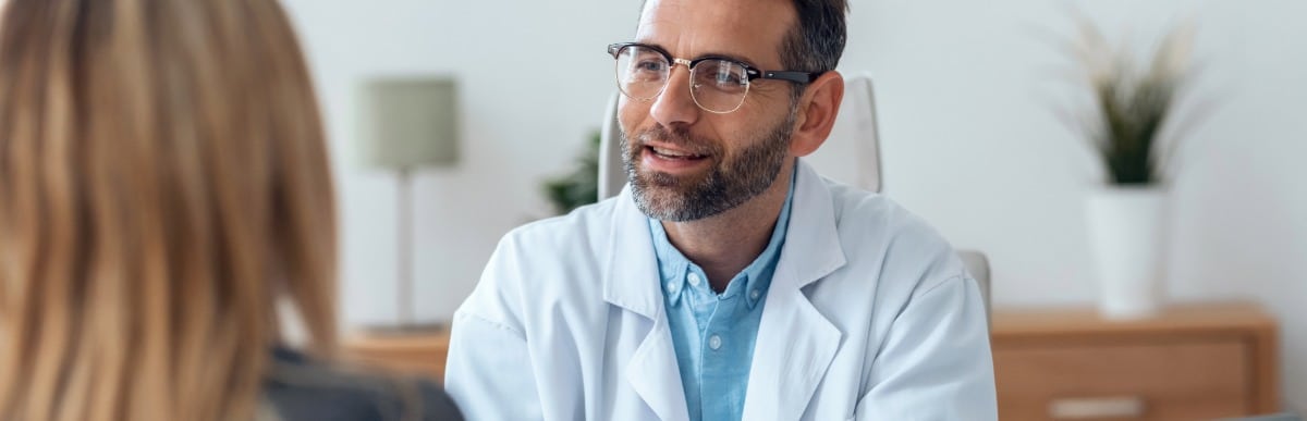 Why Blood Sugar Support Matters at Every Age-6 A doctor in a lab coat talks to a patient about blood sugar support