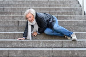 Elderly woman falling